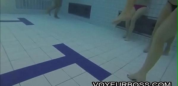  Underwater camera catches teen giving her BF a handjob in the community pool